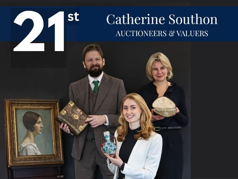 The valuation team posing with objects