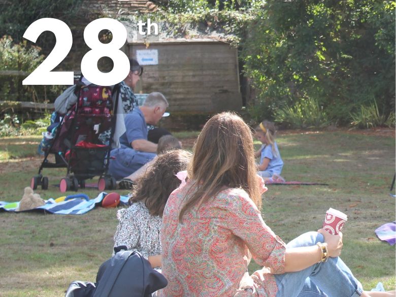 Families sitting on lawn