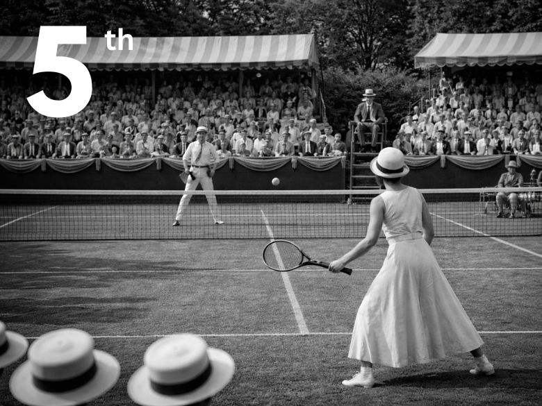 A tennis racket and ball